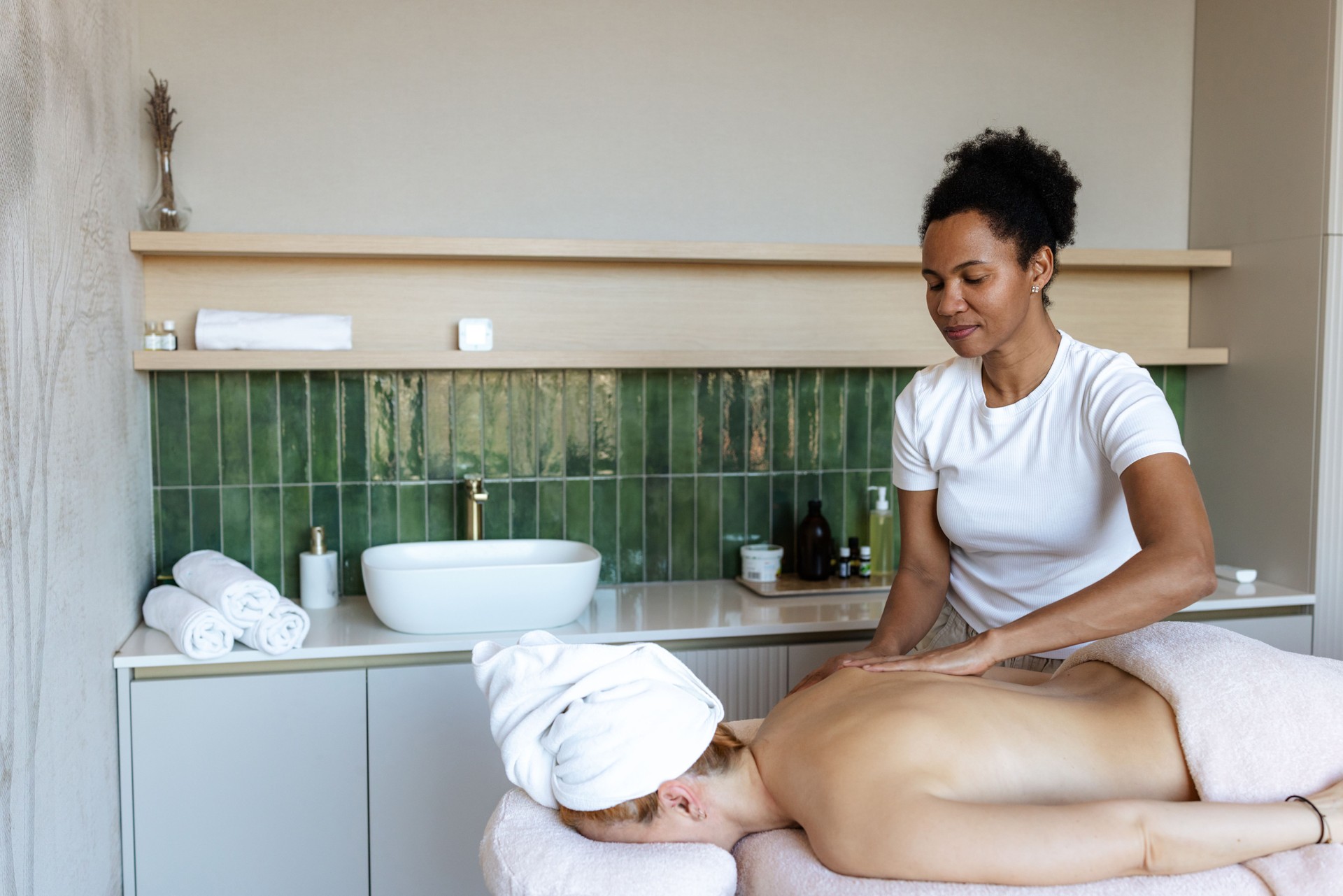 Professional massage therapy session in a calming spa environment
